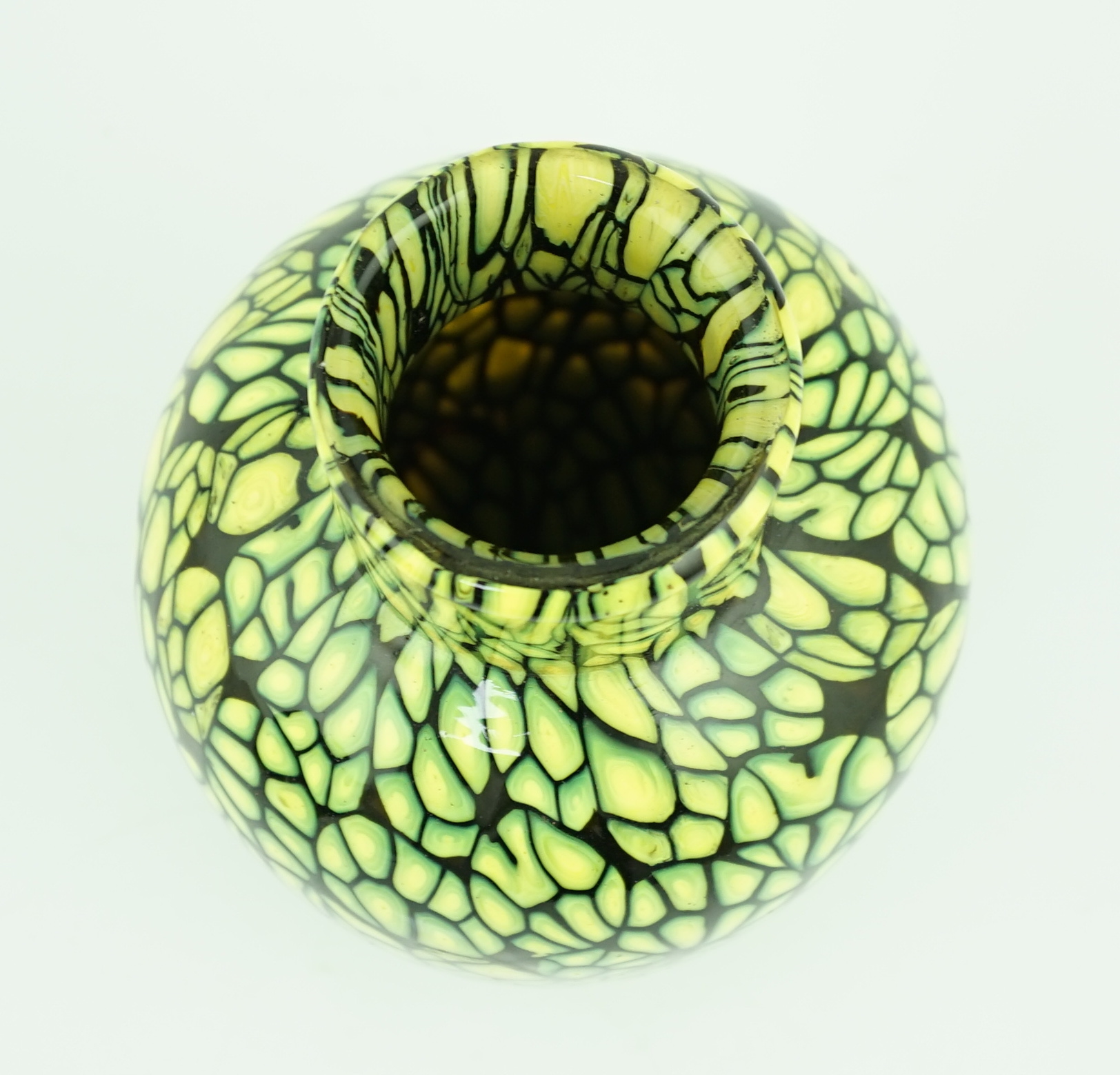 Vittorio Ferro (1932-20120 A Murano glass Murrine vase, with bright yellow murrines, on a black ground, signed, 20cm, Please note this lot attracts an additional import tax of 20% on the hammer price